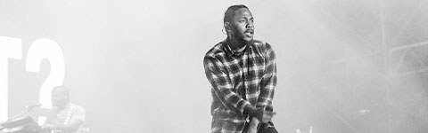 Kendrick Lamar performing on stage