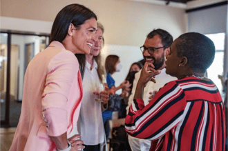 An image of a people talking together. 