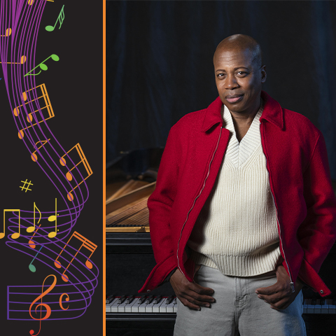 Terrence William poses in front of a piano 