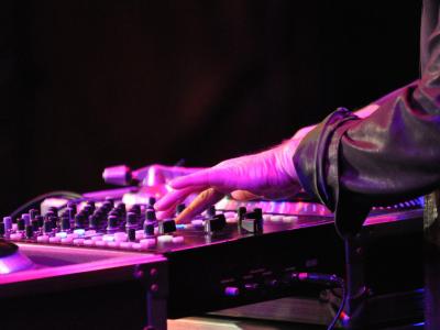 DJ performing with a turntable