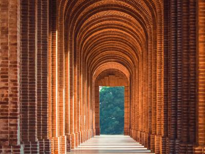 Dramatic architectural brick corridor
