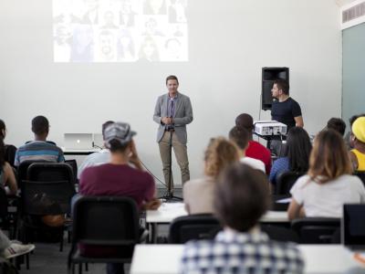 Man giving a presentation to a classroom