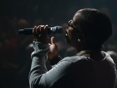 Vocalist singing into microphone