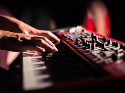 Hands on an electronic musical keyboard