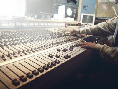 Man using mixing console