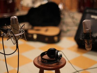 Microphones, headphones, and other sound equipment in a recording studio