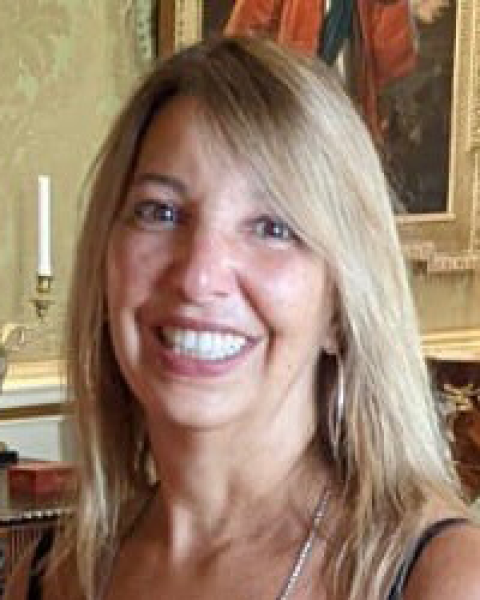 Sandra Musella smiling.