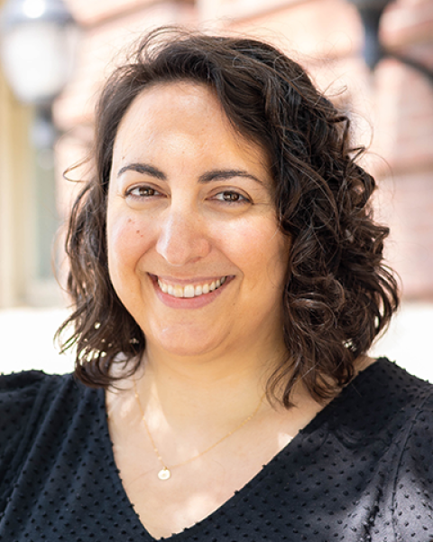 Laura Messina smiling.