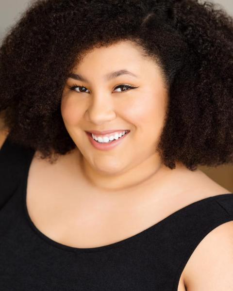 Chantal Tribble smiles directly at the camera.