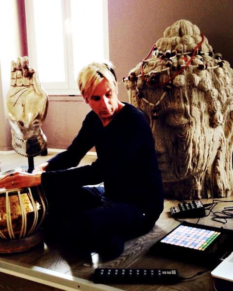 Timo Preece resting his hands on a drum