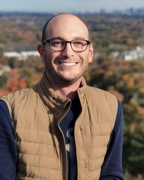 Luke Blackburn in front of forest background