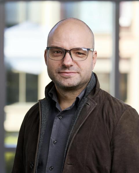 Oleg Smirnov headshot