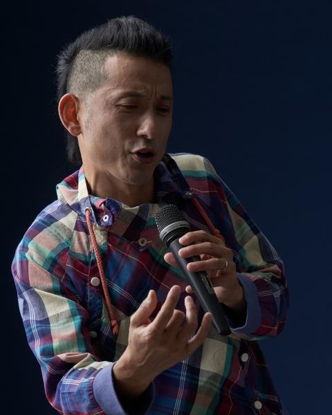Lee Abe with microphone