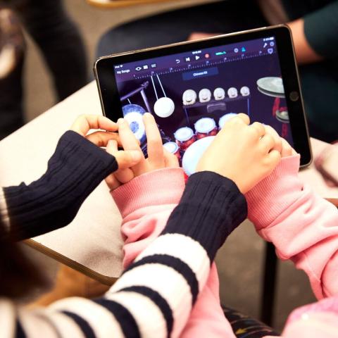 Students use a music therapy app 