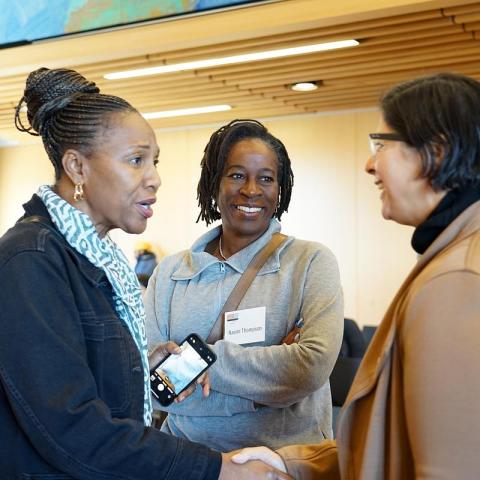 People speaking together. 