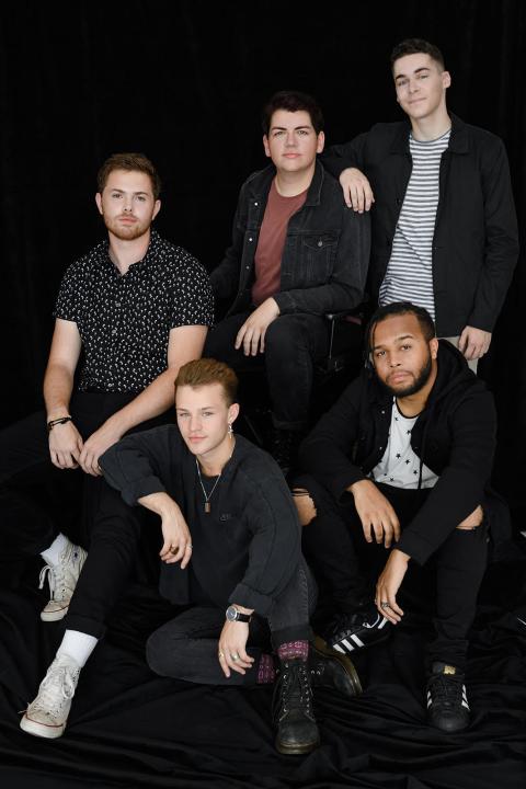 Photo of members of the a capella group Radius