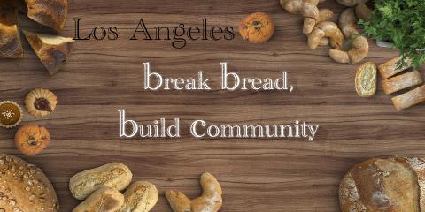 picture of table with bread, text reads 'break bread, build community'