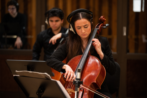 Boston Conservatory students Elaina Spiro, foreground, and Andrés Celis, background, recorded works by screen scoring students at Berklee College of Music's flagship recording studio, the Power Station at Berklee NYC.