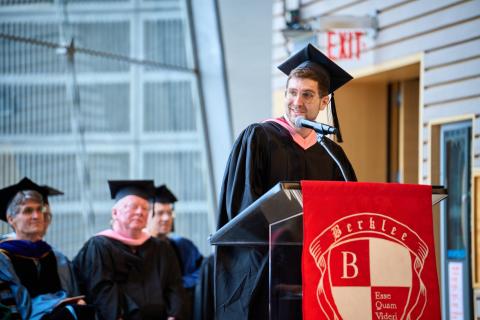 Charlie Rosen '12 addresses graduates at the 2024 Berklee NYC Commencement ceremony