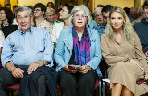 Bruce and Davi-Ellen Chabner and Egle Jarkova sitting in the audience a recital at the Vivace Vilnius festival. 