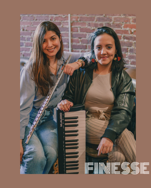 two girls holding keys and a flute