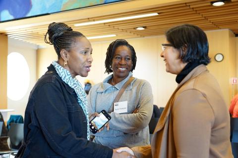 People speaking together. 