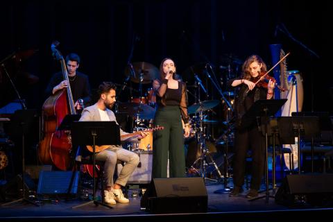 Students perform on stage during the BGJI Concert