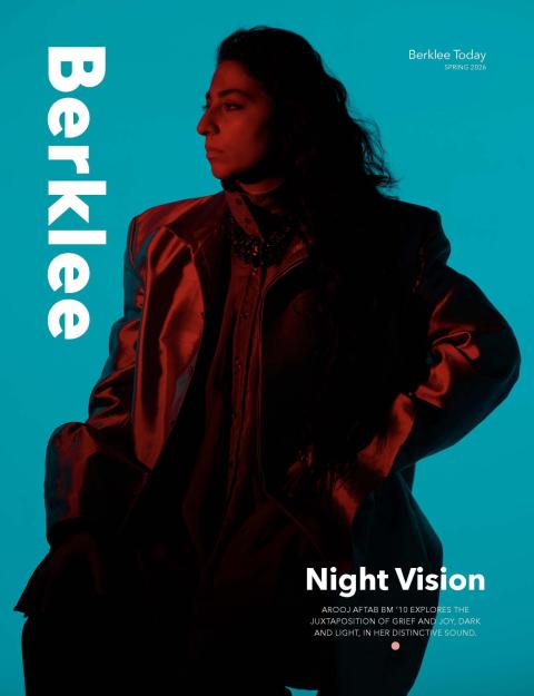 Portrait of Arooj Aftab in black and red with a turquoise background