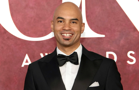 Photo of Nicholas Christopger in a tux on the Tony's red carpet