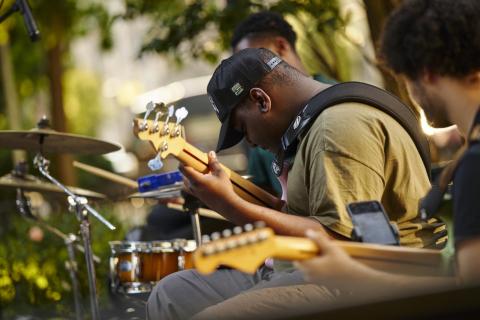 Group of musicians play outside