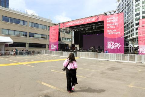 Berklee Homecoming Block Party stage with one person in the center of the frame back turned