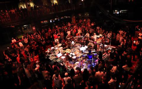 A band on stage at the House of Blues